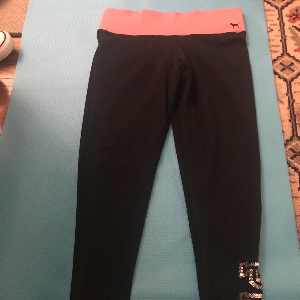 Pink yoga pants with bling on bottom leg